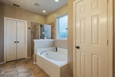 Enjoy your morning coffee on the covered patio while taking in on Ridgeview Ranch Golf Club in Texas - for sale on GolfHomes.com, golf home, golf lot