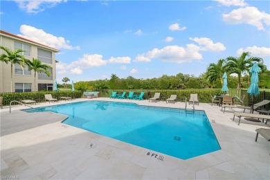 Enjoy spectacular golf course from this end unit, 2-bedroom on Windstar on Naples Bay in Florida - for sale on GolfHomes.com, golf home, golf lot