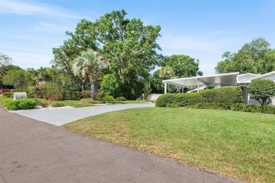 Just Steps from Lake Hollingsworth! Discover this exceptional 3 on Cleveland Heights Golf Course in Florida - for sale on GolfHomes.com, golf home, golf lot