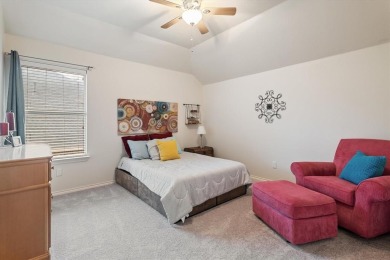 Enjoy your morning coffee on the covered patio while taking in on Ridgeview Ranch Golf Club in Texas - for sale on GolfHomes.com, golf home, golf lot