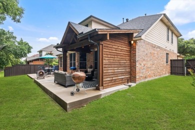 Enjoy your morning coffee on the covered patio while taking in on Ridgeview Ranch Golf Club in Texas - for sale on GolfHomes.com, golf home, golf lot