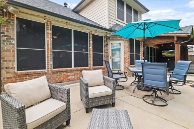 Enjoy your morning coffee on the covered patio while taking in on Ridgeview Ranch Golf Club in Texas - for sale on GolfHomes.com, golf home, golf lot