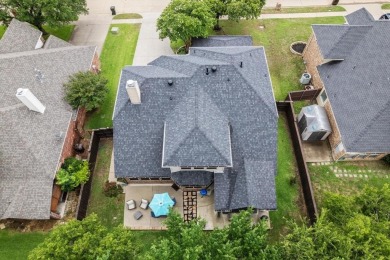 Enjoy your morning coffee on the covered patio while taking in on Ridgeview Ranch Golf Club in Texas - for sale on GolfHomes.com, golf home, golf lot