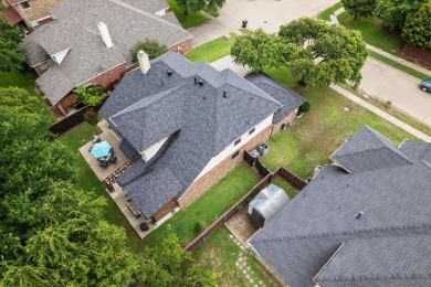 Enjoy your morning coffee on the covered patio while taking in on Ridgeview Ranch Golf Club in Texas - for sale on GolfHomes.com, golf home, golf lot