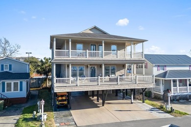 CUSTOM BUILT OCEAN VIEW RAISED BEACH HOUSE WITH HUGE WRAPAROUND on Prestwick Country Club in South Carolina - for sale on GolfHomes.com, golf home, golf lot