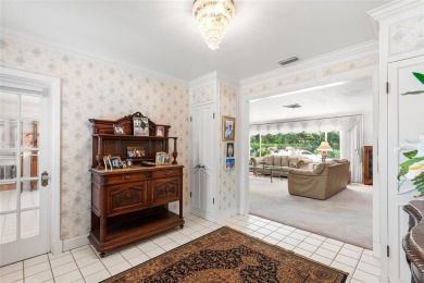 Just Steps from Lake Hollingsworth! Discover this exceptional 3 on Cleveland Heights Golf Course in Florida - for sale on GolfHomes.com, golf home, golf lot