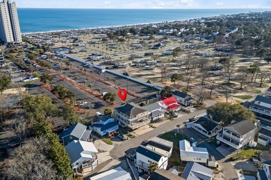 CUSTOM BUILT OCEAN VIEW RAISED BEACH HOUSE WITH HUGE WRAPAROUND on Prestwick Country Club in South Carolina - for sale on GolfHomes.com, golf home, golf lot