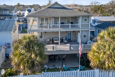 CUSTOM BUILT OCEAN VIEW RAISED BEACH HOUSE WITH HUGE WRAPAROUND on Prestwick Country Club in South Carolina - for sale on GolfHomes.com, golf home, golf lot
