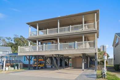 CUSTOM BUILT OCEAN VIEW RAISED BEACH HOUSE WITH HUGE WRAPAROUND on Prestwick Country Club in South Carolina - for sale on GolfHomes.com, golf home, golf lot
