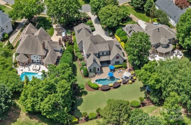 Experience Resort-Style Living at 18718 Peninsula Cove Lane! on The Peninsula Club in North Carolina - for sale on GolfHomes.com, golf home, golf lot