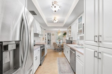 Just Steps from Lake Hollingsworth! Discover this exceptional 3 on Cleveland Heights Golf Course in Florida - for sale on GolfHomes.com, golf home, golf lot