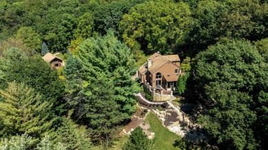 Nestled amidst the scenic beauty of mature trees and lush on Eagle Ridge Inn and Resort in Illinois - for sale on GolfHomes.com, golf home, golf lot