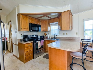 The perfect winter retreat or full-time homesteadable property on The Great Outdoors Golf and Country Club in Florida - for sale on GolfHomes.com, golf home, golf lot