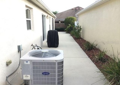 Stunning TURN-KEY 3-Bedroom Courtyard Villa with GOLF CART on Cane Garden Golf Course - Sumter in Florida - for sale on GolfHomes.com, golf home, golf lot