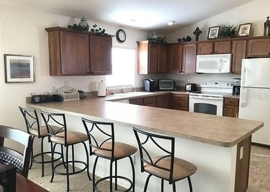 Stunning TURN-KEY 3-Bedroom Courtyard Villa with GOLF CART on Cane Garden Golf Course - Sumter in Florida - for sale on GolfHomes.com, golf home, golf lot