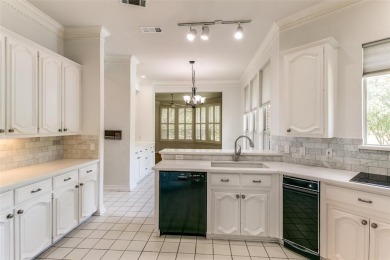 Welcome to this elegant, Scott Zimmerman custom-built home on Hackberry Creek Country Club in Texas - for sale on GolfHomes.com, golf home, golf lot