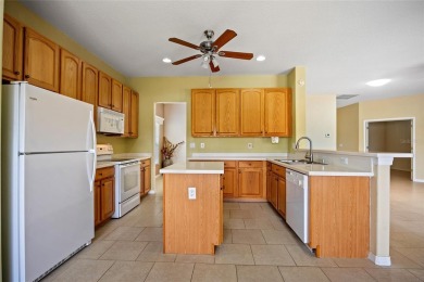 WELL-MAINTAINED 3 BEDROOM, 2 BATH, 2-CAR GARAGE W/ POOL BUILT BY on Maple Leaf Golf and Country Club in Florida - for sale on GolfHomes.com, golf home, golf lot