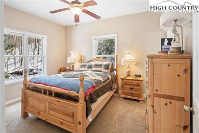 Private, light filled mountain retreat with golf course and on Mountain Aire Golf Course in North Carolina - for sale on GolfHomes.com, golf home, golf lot