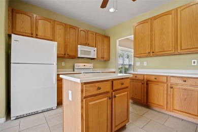 WELL-MAINTAINED 3 BEDROOM, 2 BATH, 2-CAR GARAGE W/ POOL BUILT BY on Maple Leaf Golf and Country Club in Florida - for sale on GolfHomes.com, golf home, golf lot