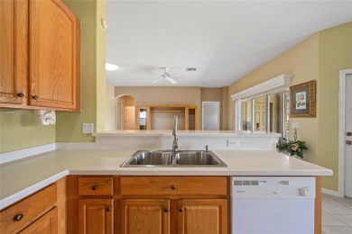WELL-MAINTAINED 3 BEDROOM, 2 BATH, 2-CAR GARAGE W/ POOL BUILT BY on Maple Leaf Golf and Country Club in Florida - for sale on GolfHomes.com, golf home, golf lot