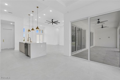 This newly built home in Port Charlotte, FL, is a luxury gem on Rotonda Golf and Country Club - Long Marsh  in Florida - for sale on GolfHomes.com, golf home, golf lot