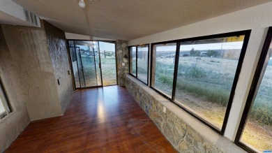 VIEWS and lots of room.  This lovely home has so much space with on Silver City Golf Course in New Mexico - for sale on GolfHomes.com, golf home, golf lot