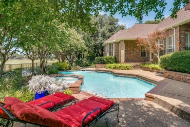 Welcome to this elegant, Scott Zimmerman custom-built home on Hackberry Creek Country Club in Texas - for sale on GolfHomes.com, golf home, golf lot