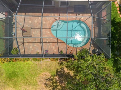 WELL-MAINTAINED 3 BEDROOM, 2 BATH, 2-CAR GARAGE W/ POOL BUILT BY on Maple Leaf Golf and Country Club in Florida - for sale on GolfHomes.com, golf home, golf lot