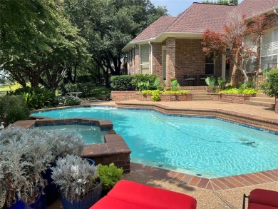 Welcome to this elegant, Scott Zimmerman custom-built home on Hackberry Creek Country Club in Texas - for sale on GolfHomes.com, golf home, golf lot