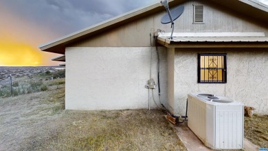 VIEWS and lots of room.  This lovely home has so much space with on Silver City Golf Course in New Mexico - for sale on GolfHomes.com, golf home, golf lot