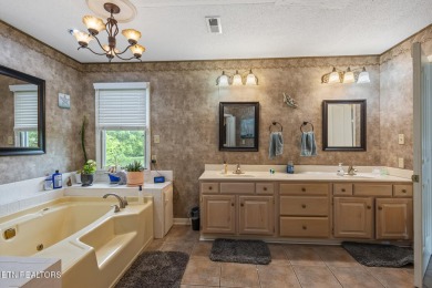 HOME WARRANTY INCLUDED + $3,000 FLOORING ALLOWANCE! on Riverview Golf Course in Tennessee - for sale on GolfHomes.com, golf home, golf lot