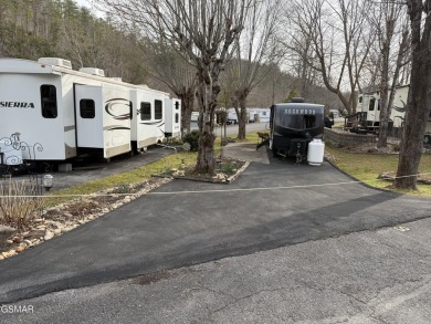 Beautifully landscaped VACANT lot in the middle of the park that on Bent Creek Golf Course in Tennessee - for sale on GolfHomes.com, golf home, golf lot
