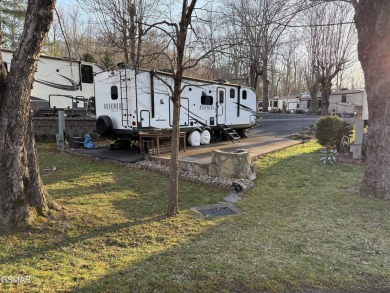 Beautifully landscaped VACANT lot in the middle of the park that on Bent Creek Golf Course in Tennessee - for sale on GolfHomes.com, golf home, golf lot
