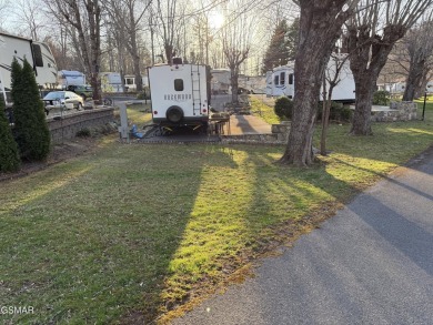 Beautifully landscaped VACANT lot in the middle of the park that on Bent Creek Golf Course in Tennessee - for sale on GolfHomes.com, golf home, golf lot