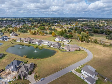 Experience lakeside living in the exclusive, gated community of on LeTriomphe Golf and Country Club in Louisiana - for sale on GolfHomes.com, golf home, golf lot