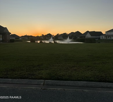 Experience lakeside living in the exclusive, gated community of on LeTriomphe Golf and Country Club in Louisiana - for sale on GolfHomes.com, golf home, golf lot