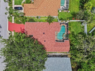 Welcome to your private oasis in the heart of Tarpon Springs! on Tarpon Springs Golf Course in Florida - for sale on GolfHomes.com, golf home, golf lot