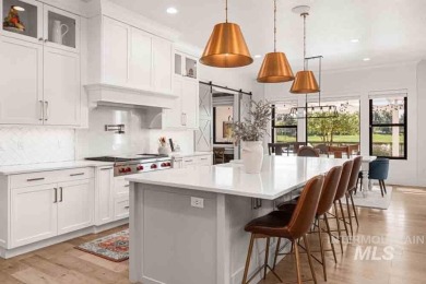 Welcome to this stunning waterfront estate in the prestigious on SpurWing Country Club in Idaho - for sale on GolfHomes.com, golf home, golf lot