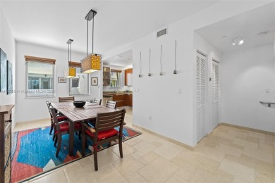 Stunning 4-story townhouse in Normandy Isles, DIRECTLY on the on Normandy Shores Golf Course in Florida - for sale on GolfHomes.com, golf home, golf lot