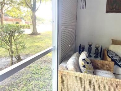 Beautiful 2-bedroom, 2-bathroom CORNER AND FIRST FLOOR condo in on Oriole Golf and Tennis Club in Florida - for sale on GolfHomes.com, golf home, golf lot