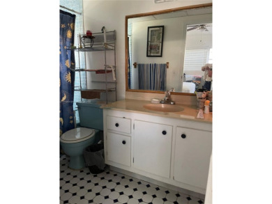 Beautiful 2-bedroom, 2-bathroom CORNER AND FIRST FLOOR condo in on Oriole Golf and Tennis Club in Florida - for sale on GolfHomes.com, golf home, golf lot