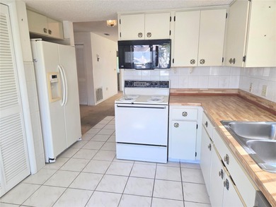 Beautiful End Unit in Highly Rated Condominium Community!
 on Beacon Woods Golf Club in Florida - for sale on GolfHomes.com, golf home, golf lot