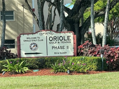 Beautiful 2-bedroom, 2-bathroom CORNER AND FIRST FLOOR condo in on Oriole Golf and Tennis Club in Florida - for sale on GolfHomes.com, golf home, golf lot