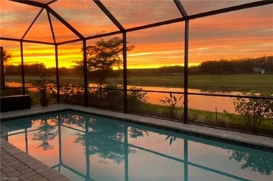 THIS HOME CHECKS OFF THE BOXES - POOL, GOLF COURSE AND WATER on Panther Run Golf Club in Florida - for sale on GolfHomes.com, golf home, golf lot