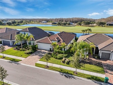 THIS HOME CHECKS OFF THE BOXES - POOL, GOLF COURSE AND WATER on Panther Run Golf Club in Florida - for sale on GolfHomes.com, golf home, golf lot