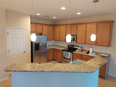 Welcome to your dream home in a sought-after golf community! on Herons Glen Golf and Country Club in Florida - for sale on GolfHomes.com, golf home, golf lot