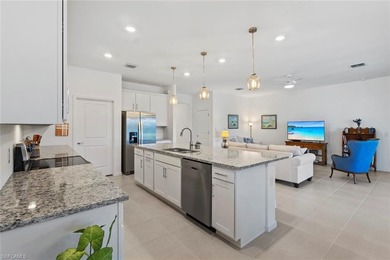 THIS HOME CHECKS OFF THE BOXES - POOL, GOLF COURSE AND WATER on Panther Run Golf Club in Florida - for sale on GolfHomes.com, golf home, golf lot