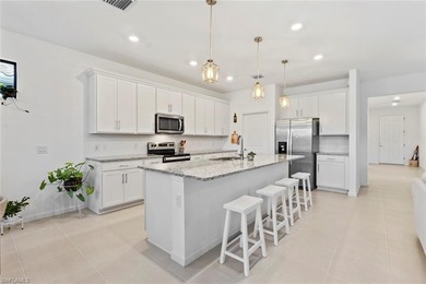 THIS HOME CHECKS OFF THE BOXES - POOL, GOLF COURSE AND WATER on Panther Run Golf Club in Florida - for sale on GolfHomes.com, golf home, golf lot