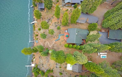 Stunning Lakefront Retreat with Panoramic Views of Lake Almanor on Lake Almanor Country Club in California - for sale on GolfHomes.com, golf home, golf lot