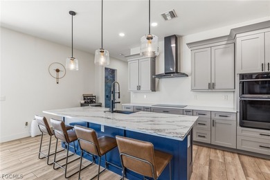 Welcome home to this singular creation, designed with intention on Burnt Store Golf Club in Florida - for sale on GolfHomes.com, golf home, golf lot